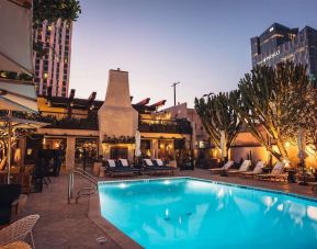 Outdoor pool at night at Hotel Figueroa.