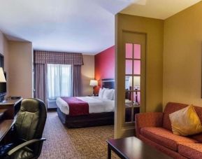 Spacious king room with work area at Hotel Pearland.