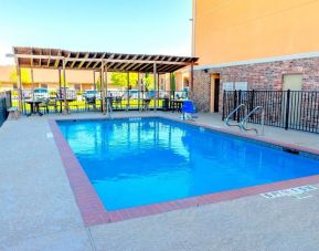 Outdoor pool at Hotel Pearland.