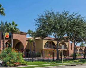 Outdoor garden space at Super 8 By Wyndham Houston/Webster.