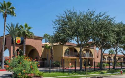 Outdoor garden space at Super 8 By Wyndham Houston/Webster.