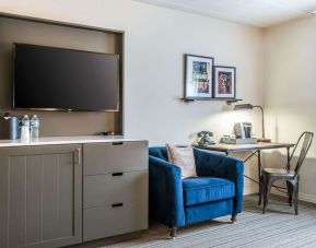 Day use room with TV and work space at EnVision Hotel St. Paul South.