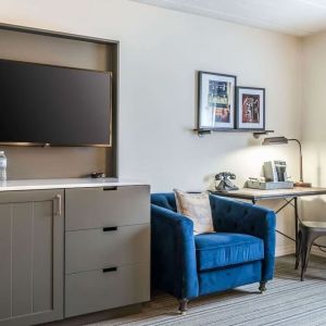 Day use room with TV and work space at EnVision Hotel St. Paul South.