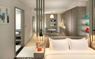 Spacious king room with lounge area at Capri By Fraser Johor Bahru.