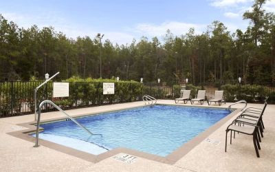 Relaxing outdoor pool at Hampton Inn & Suites Conroe - I-45 North.
