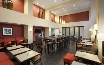 Coworking space and dining area at Hampton Inn & Suites Conroe - I-45 North.