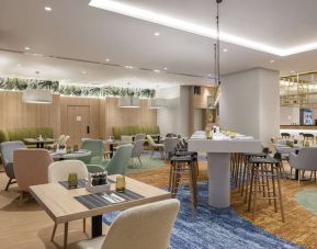 Lounge and lobby area at Hilton Garden Inn Tbilisi Riverview.