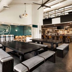 Relaxing coworking space at EnVision Hotel Miami International Airport.