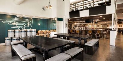 Relaxing coworking space at EnVision Hotel Miami International Airport.