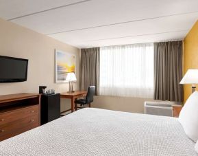 Day use room with TV and work space at Days Inn Miami International Airport,