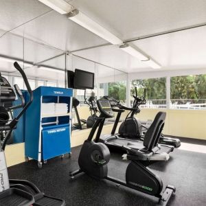 Fitness center at EnVision Hotel Miami International Airport.