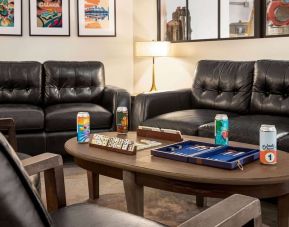 Lounge and game room at Days Inn Miami International Airport,