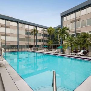 Beautiful outdoor pool at EnVision Hotel Miami International Airport.
