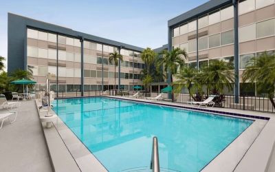 Beautiful outdoor pool at EnVision Hotel Miami International Airport.