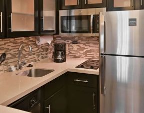 In-room kitchen at Sonesta ES Suites Fort Lauderdale Plantation.