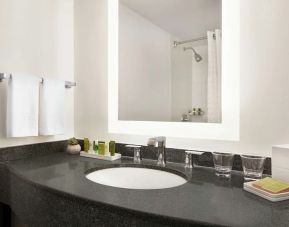 Guest bathroom with shower at Hilton Scottsdale Resort & Villas.