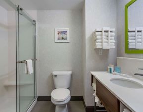 Guest bathroom with shower at Hampton Inn & Suites By Hilton Edmonton/West.