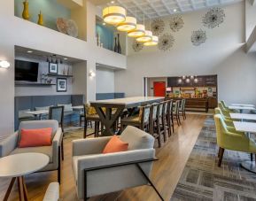 Coworking space and lobby at Hampton Inn & Suites By Hilton Edmonton/West.