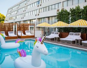 Fun in the sun in this stunning outdoor pool at Hotel Dena, Pasadena Los Angeles.