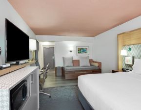 Spacious king room with TV and work space at Holiday Inn Roanoke Airport-Conference Center.