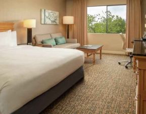 King guestroom with desk and sofa at the DoubleTree by Hilton Sonoma Wine Country.