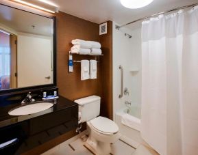 Guest bathroom with shower and bath at Fairfield Inn East Rutherford Meadowlands.