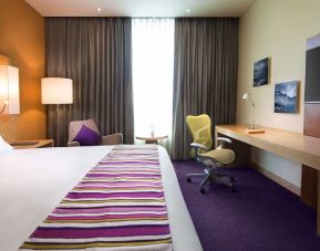 Spacious king room with natural light at Hilton Garden Inn Monterrey Airport, Nuevo Leon, Mexico.