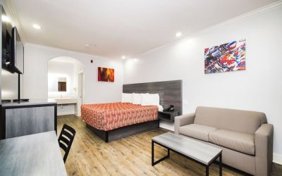 Day use room with TV and work station at Palace Inn 290 & Fairbanks.