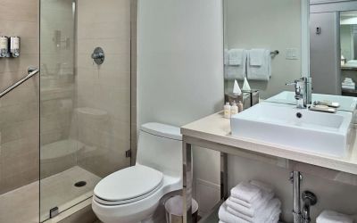 Guest bathroom with shower at Sonesta Fort Lauderdale Beach.