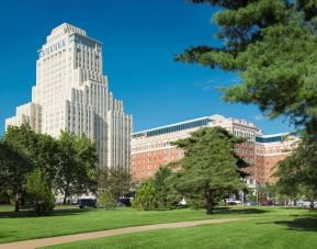 Hotel exterior with garden at The Chase Park Plaza Royal Sonesta St. Louis.