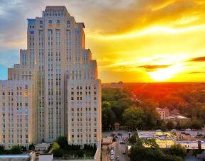 Hotel exterior at sunset at The Chase Park Plaza Royal Sonesta St. Louis.