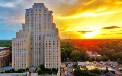 Hotel exterior at sunset at The Chase Park Plaza Royal Sonesta St. Louis.
