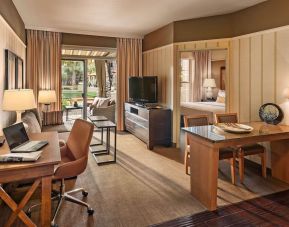 Spacious day room with work station at Sonesta Suites Scottsdale Gainey Ranch.