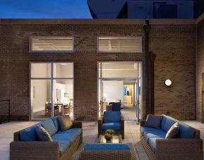 Outdoor lounge and coworking space at Sonesta ES Suites New Orleans.