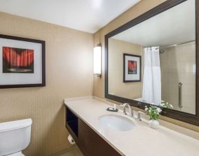 Guest bathroom with shower at Sonesta Los Angeles Airport LAX.