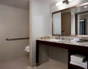 Guest bathroom with shower at Sonesta Redondo Beach & Marina.