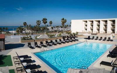 Lovely outdoor pool and pool chairs at Sonesta Redondo Beach & Marina.