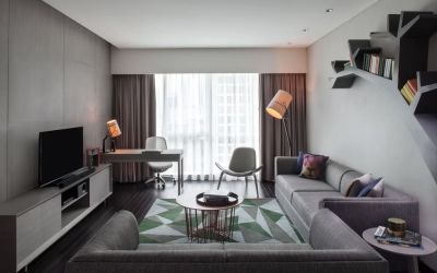 Spacious king room with lounge at Fraser Place Setiabudi Jakarta.