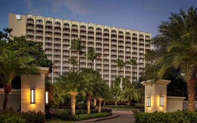 Hotel exterior at night at Royal Sonesta San Juan.