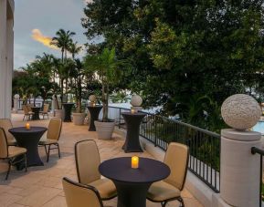 Outdoor dining and terrace at Royal Sonesta San Juan.