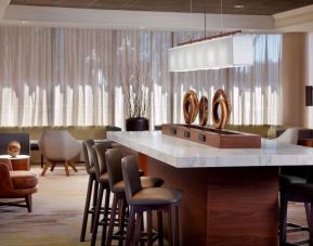 Coworking space and bar area at Sonesta Select Atlanta Cumberland Galleria.
