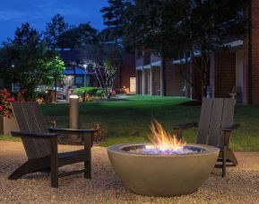 Outdoor seating and fire pit at Sonesta Select Boston Foxborough Mansfield.