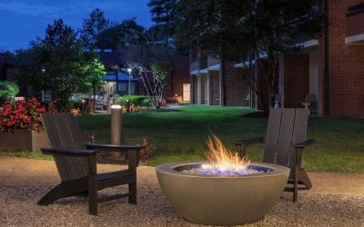 Outdoor seating and fire pit at Sonesta Select Boston Foxborough Mansfield.