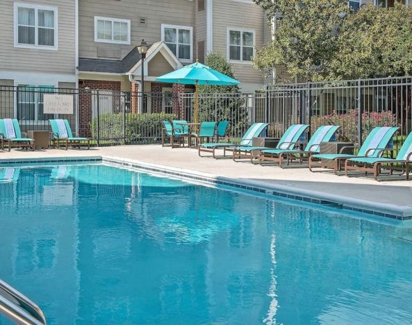 Outdoor pool at Sonesta ES Suites Raleigh Durham Airport Morrisville.