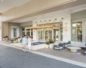 Hotel entrance and parking at Signia By Hilton Orlando Bonnet Creek.