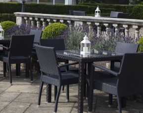 Outdoor seating area at DoubleTree By Hilton Oxford Belfry.