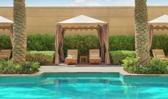 Pool cabanas at Hilton Dubai Al Habtoor City.