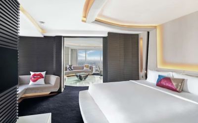 Romantic king room with natural light at V Hotel Dubai.