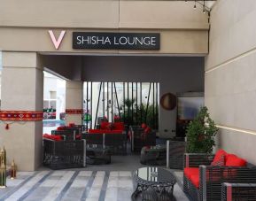 Street-side hotel lounge and restaurant at V Hotel Dubai.
