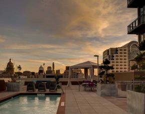 Outdoor pool at sunset at Hampton Inn & Suites Austin @ The UniversityCapitol.